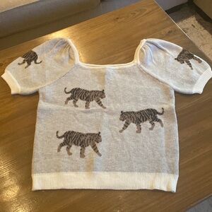 Square neck tiger sweater.